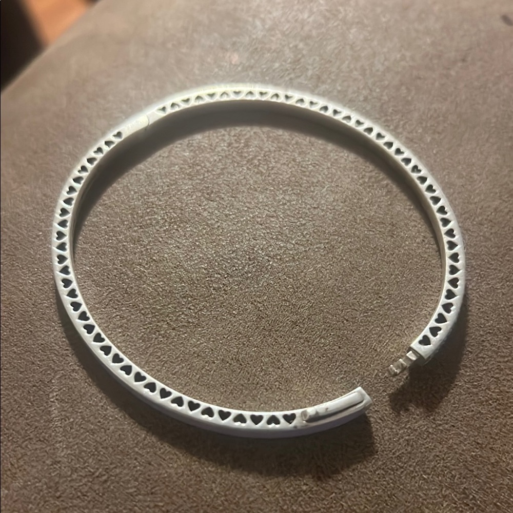 Pandora 925 Real Silver.  Half light purple enamel and half pave stones.